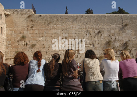 Visitors at the Western wall or Wailing Wall in the old city East Jerusalem Israel Stock Photo