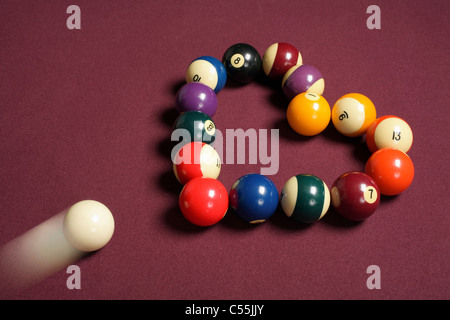 Breaking heart concept using billiard balls Stock Photo