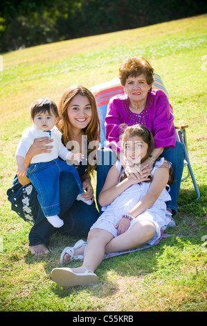 Portrait of a happy family in the park Stock Photo