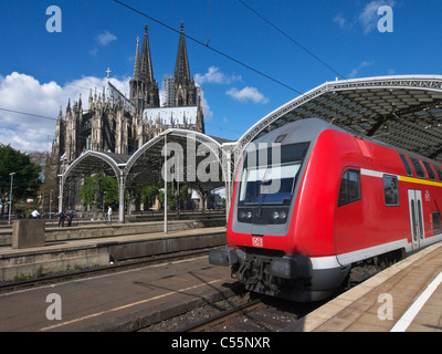 Cologne Hauptbahnhof or main railway station with historic Cathedral or Dom to rear Germany Stock Photo