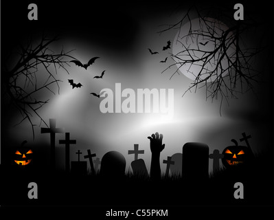 Spooky graveyard with zombie hand coming out of the ground Stock Photo