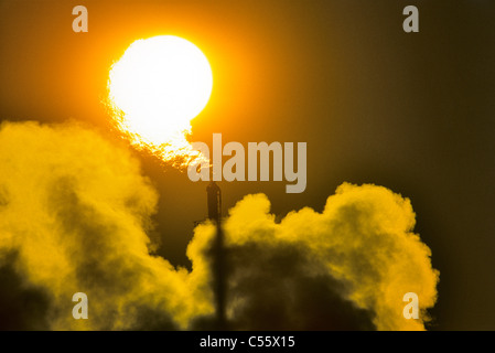 Smoke erupting from a flarestack, Edmonton, Alberta, Canada Stock Photo