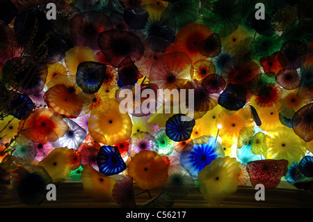 Fiori di Como, a glass sculpture that is lit from behind, covers the ceiling of the Bellagio lobby. Stock Photo