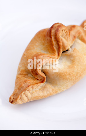Cornish pasty cut out on white background Stock Photo