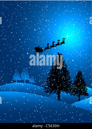 Silhouette of santa flying through the sky on a snowy night Stock Photo