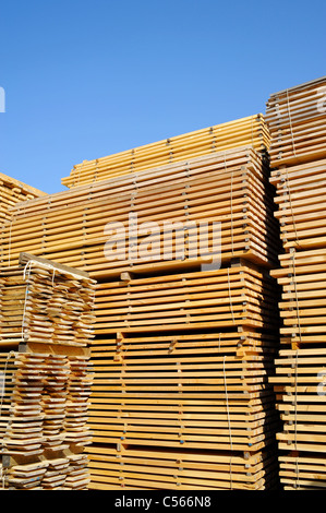 Stack of boards in lumber yard Stock Photo