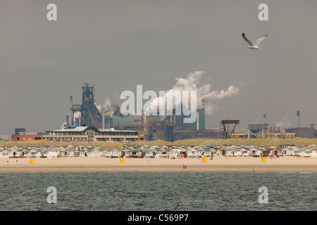 People enjoy the beach of Ijmuiden near the Tata Steel plant on News  Photo - Getty Images