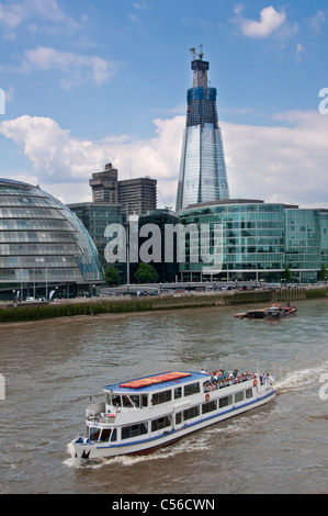 Tourist boat on river Thames with the Shard building in the background. London. UK. Stock Photo