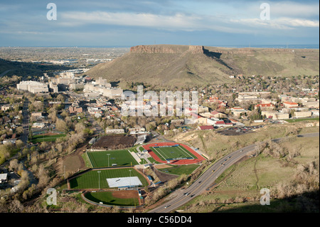Golden, Colorado with Colorado School of Mines' athletic fields.  Coors brewery, South Table Mountain and Castle Rock in back. Stock Photo