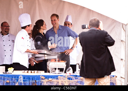 The duke and duchess of Cambridge enjoy seafood on the beach in Prince Edward Island, Canada during the Royal Visit. Stock Photo