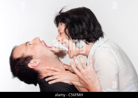 couple fighting, yelling at each other - isolated on white Stock Photo