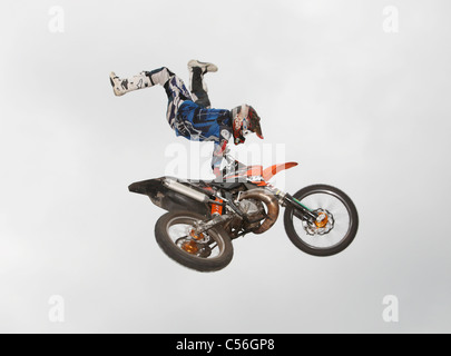Freestyle Moto FMX riders in mid air Stock Photo