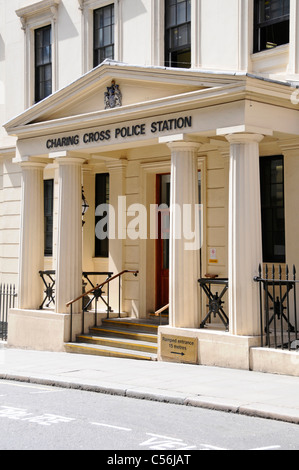 London street Charing Cross Metropolitan Police Station Agar Street entrance portico and colonnade with steps & sign for wheelchair access England UK Stock Photo