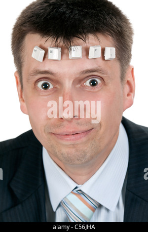 ord HELP composed of keys of the keyboard on the forehead businessman Stock Photo