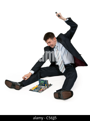 businessman-with-a-hammer-breaking-a-motherboard-c56jj5.jpg