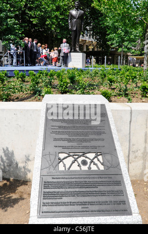 Historical plaque to USA President Ronald Reagan in front of statue  at unveiling at United States American Embassy in Grosvenor Square London UK Stock Photo