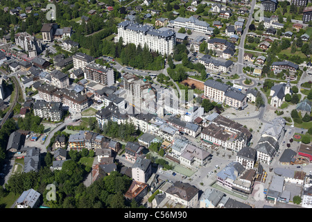 AERIAL VIEW. The city center of Chamonix and the Arve River. Haute-Savoie, Auvergne-Rhône-Alpes, France. Stock Photo