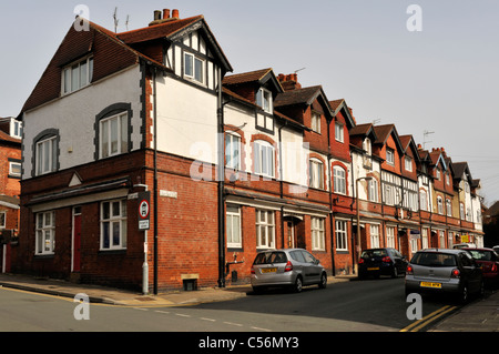 Back to back Victorian red brick terrace houses Chapeltown area Leeds, West Yorkshire, England Stock Photo