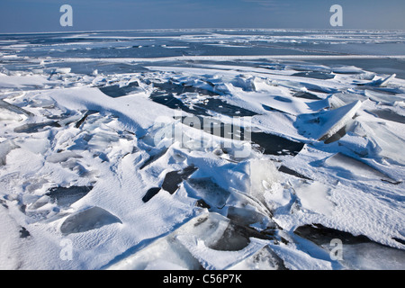 The Netherlands, Oosterdijk, View on frozen lake called IJsselmeer. Stock Photo