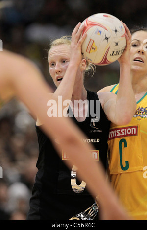 10.07.2011 Laura Langman of New Zealand(black) in action during the Finals between Australia and New Zealand, Mission Foods World Netball Championships 2011 from the Singapore Indoor Stadium in Singapore. Stock Photo