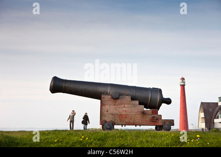 The Netherlands, Den Helder, lighthouse and cannon. Stock Photo