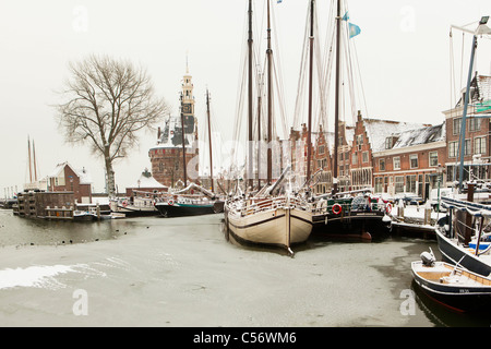 The Netherlands, Hoorn, harbour for traditional sailing boats. Winter, snow. Stock Photo