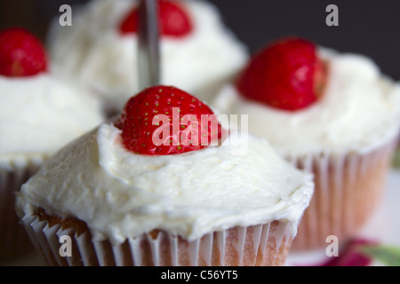 Strawberry cupcakes on a cake stand Stock Photo