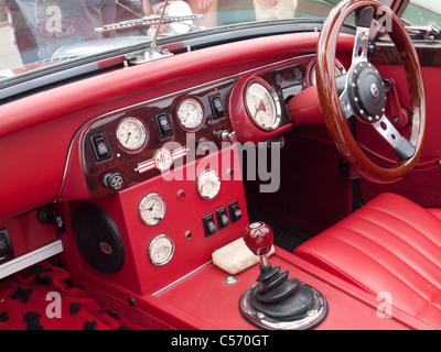 Driving compartment of a Sebring Racing converted MG Midget Sports Car at a seaside rally Stock Photo