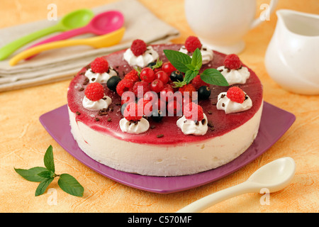 Cold cheese tart with berries. Recipe available. Stock Photo
