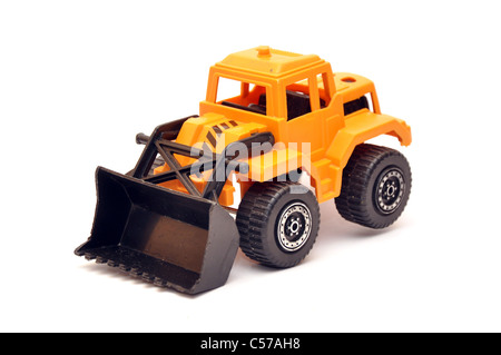 Yellow toy digger over a white background with soft shadow Stock Photo