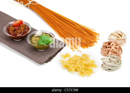 different kinds of pasta with pesto two different varieties Stock Photo