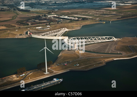 The Netherlands, Rotterdam, Closed Storm Surge Barrier in river called De Nieuwe Waterweg. Aerial. Stock Photo