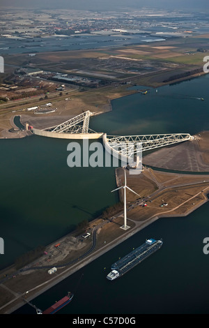 The Netherlands, Rotterdam, Closed Storm Surge Barrier in river called De Nieuwe Waterweg. Aerial. Stock Photo