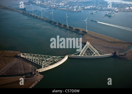 The Netherlands, Rotterdam, Closed Storm Surge Barrier in river called De Nieuwe Waterweg. Aerial. Stock Photo