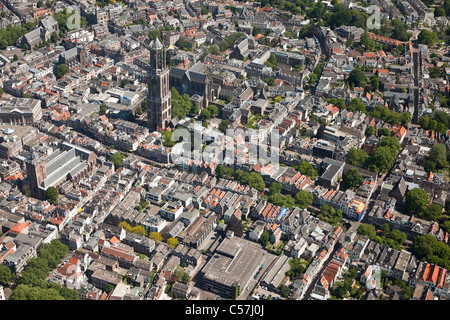 The Netherlands, Utrecht, View on cathedral called De Dom in the city center. Aerial. Stock Photo