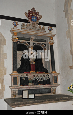 Elizabethan style memorial to Adrian and Mary Stoughton parents of 16 children in St.Andrews Church West Stoke. Stock Photo