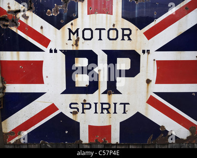 An old enamel sign advertising BP Motor Spirit petrol. Stock Photo