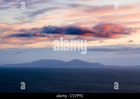 Evening clouds over South Uist from Skye, Scotland, UK. Stock Photo