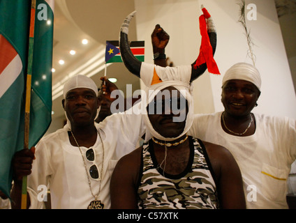 South Sudanese man holds the flag of Republic of South Sudan during independence celebrations Stock Photo