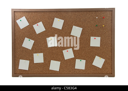 A simple brown cork board with some blank note papers pinned on Stock Photo
