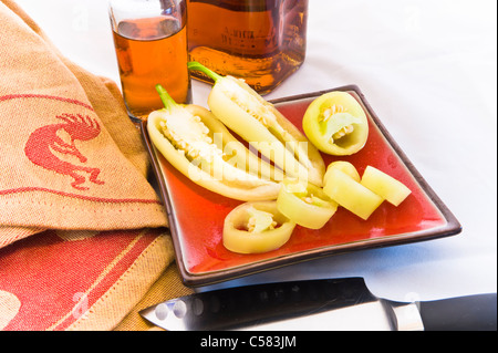 This small yellow peppers are some of the hottest around. They go good with Tequila. Stock Photo