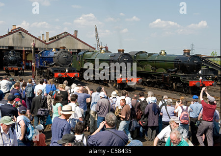 Railway enthusiasts watching steam locomotives at Didcot Railway Centre, Didcot, Oxfordshire, UK