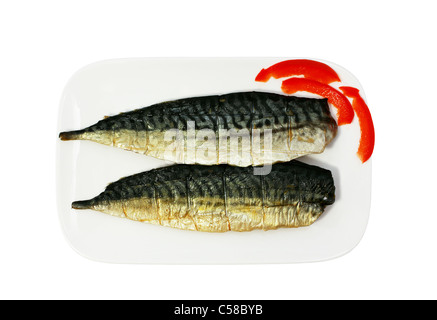 half of smoked mackerel on the plate isolated Stock Photo