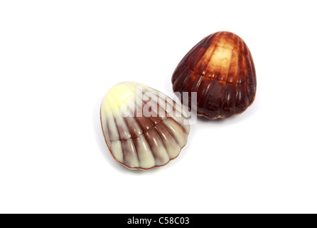 two chocolate candies in the shape of seashell Stock Photo