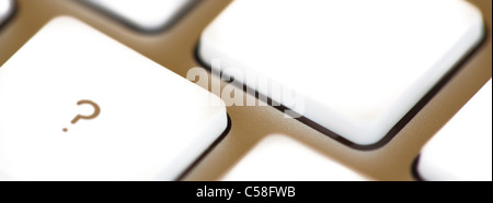 Question mark (?) key on keyboard. Stock Photo