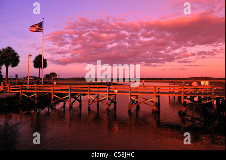 Flag, Fishing, Pier, Bayport Park, Dusk, Pine Island, near Spring Hill, Florida, USA, United States, America, sunset Stock Photo