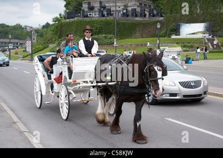 tourists on a horse and cart carriage niagara falls ontario canada Stock Photo