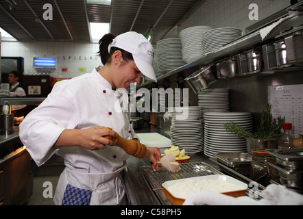 Cook preparing food Stock Photo