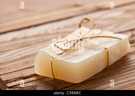 Piece of handmade lemon soap. Stock Photo