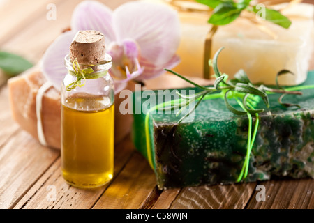 Pieces of natural soap with herbs. Stock Photo